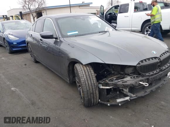 ✅ 2022 BMW 3 Series 330i • VIN: 3MW5R1J01N8C33802 • Lot: 41856666. Listed on IAAI with 41,095 mi. Free auction sales archive from the USA and detailed vehicle history report at DreamBid. Image 1.