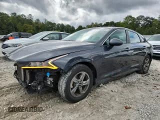 ✅ 2022 Kia K5 LXS • VIN: 5XXG14J24NG110123 • Лот: 82277095. Опубликован ранее на Copart с пробегом 150 673 миль. Бесплатный доступ к архиву аукционных продаж из США и подробный отчёт об истории автомобиля на DreamBid. Изображение 1.