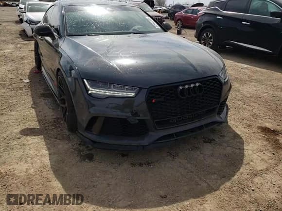 ✅ 2016 Audi RS 7 Prestige • VIN: WUAW2AFC2GN901494 • Lot: 52958345. Wystawiony na Copart z przebiegiem 99 718 mil. Bezpłatny archiwum sprzedaży aukcyjnych z USA i szczegółowy raport historii pojazdu na DreamBid. Zdjęcie 13.
