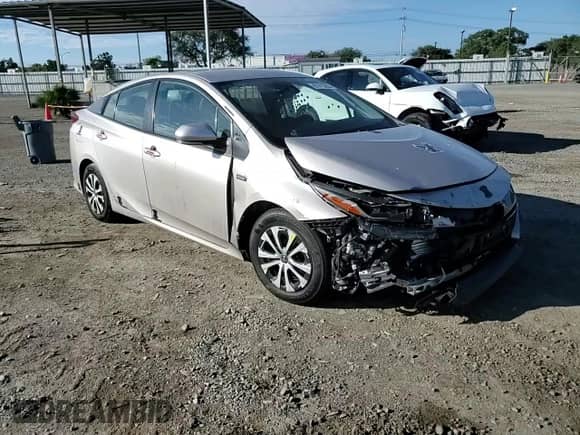 2021 Toyota Prius LE z VIN JTDKAMFP6M3174337, wystawiony jako Copart lot #81413265 z przebiegiem 142 475 mil mil oraz Szkoda całkowita • Salvage title. Historia ofert i sprzedaży dostępna na DreamBid. Obrazek 14.
