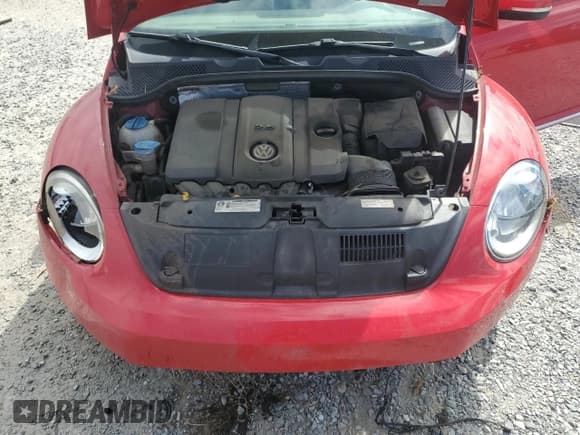 ✅ 2014 Volkswagen Beetle 2.5L • VIN: 3VWJP7AT7EM611842 • Лот: 81040665. Опубликован ранее на Copart с пробегом 142 970 миль. Бесплатный доступ к архиву аукционных продаж из США и подробный отчёт об истории автомобиля на DreamBid. Изображение 11.