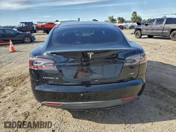 ✅ 2014 Tesla Model S 60 • VIN: 5YJSA1H11EFP49505 • Лот: 93864535. Опубликован ранее на Copart с пробегом 158 146 миль. Бесплатный доступ к архиву аукционных продаж из США и подробный отчёт об истории автомобиля на DreamBid. Изображение 6.