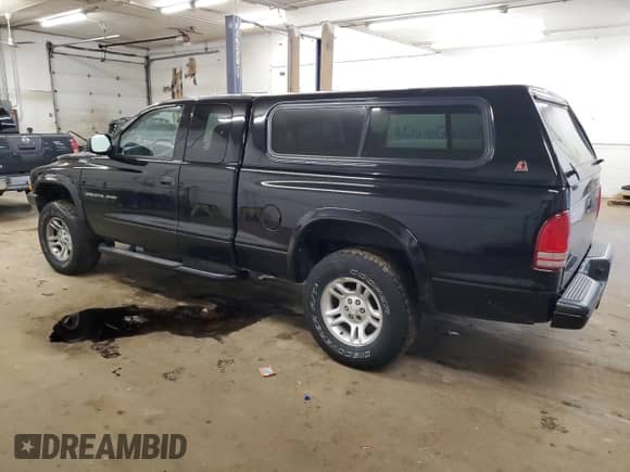 2002 Dodge Dakota Sport z VIN 1B7GG32N92S563589, wystawiony jako Copart lot #79580194 z przebiegiem 110 736 mil mil oraz Czysty tytuł • Clean title. Historia ofert i sprzedaży dostępna na DreamBid. Obrazek 2.