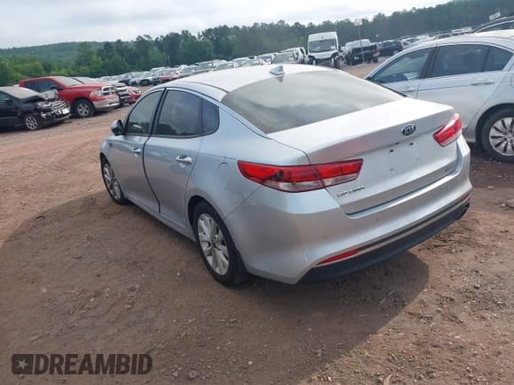 ✅ 2018 Kia Optima S • VIN: 5XXGT4L39JG264711 • Lot: 42456102. Listed on IAAI with 127,382 mi. Free auction sales archive from the USA and detailed vehicle history report at DreamBid. Image 3.