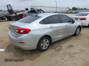 ✅ 2018 Chevrolet Cruze LS • VIN: 1G1BC5SM5J7214433 • Lot: 42616404. Listed on IAAI with 171,129 mi. Free auction sales archive from the USA and detailed vehicle history report at DreamBid. Image 4.