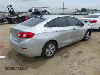 ✅ 2018 Chevrolet Cruze LS • VIN: 1G1BC5SM5J7214433 • Lot: 42616404. Listed on IAAI with 171,129 mi. Free auction sales archive from the USA and detailed vehicle history report at DreamBid. Image 4.