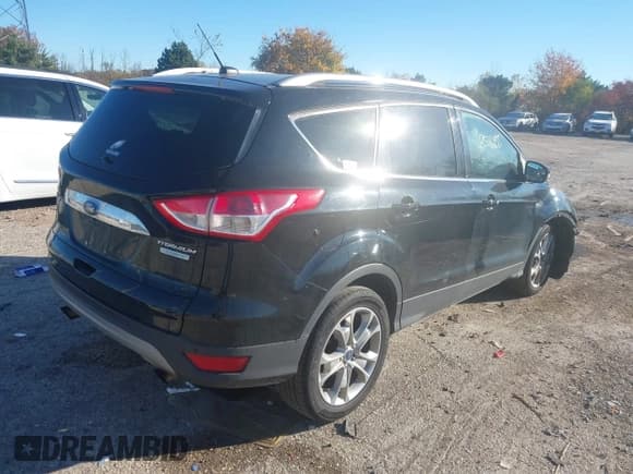 ✅ 2016 Ford Escape Titanium • VIN: 1FMCU0J90GUA15059 • Лот: 43526955. Опубликован ранее на IAAI с пробегом 163 883 миль. Бесплатный доступ к архиву аукционных продаж из США и подробный отчёт об истории автомобиля на DreamBid. Изображение 4.