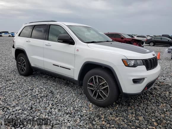2019 Jeep Grand Cherokee Trailhawk с VIN 1C4RJFLT3KC645904, выставлен на аукционе Copart как лот 59678895 с пробегом 70 456 миль миль и Списание • Salvage title. История ставок и продаж доступна на DreamBid. Изображение 4.