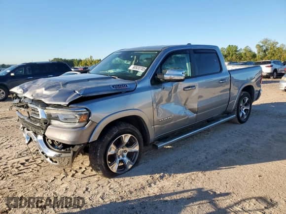 2022 Ram 1500 Laramie с VIN 1C6RREJM8NN187582, выставлен на аукционе Copart как лот 90920705 с пробегом 97 286 миль миль и Списание • Salvage title. История ставок и продаж доступна на DreamBid. Изображение 1.