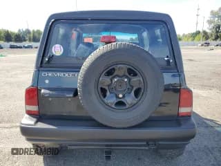 ✅ 1998 Chevrolet Tracker • VIN: 2CNBJ1868W6925819 • Лот: 70881874. Опубликован ранее на Copart с пробегом 180 849 миль. Бесплатный доступ к архиву аукционных продаж из США и подробный отчёт об истории автомобиля на DreamBid. Изображение 6.