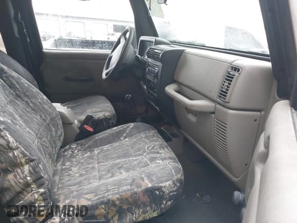 ✅ 2005 Jeep Wrangler Unlimited • VIN: 1J4FA44S15P301007 • Lot: 43384865. Listed on IAAI with 133,877 mi. Free auction sales archive from the USA and detailed vehicle history report at DreamBid. Image 5.