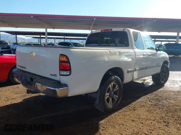 ✅ 2002 Toyota Tundra SR5 • VIN: 5TBRT34162S251911 • Lot: 43676265. Listed on IAAI with 316,814 mi. Free auction sales archive from the USA and detailed vehicle history report at DreamBid. Image 4.