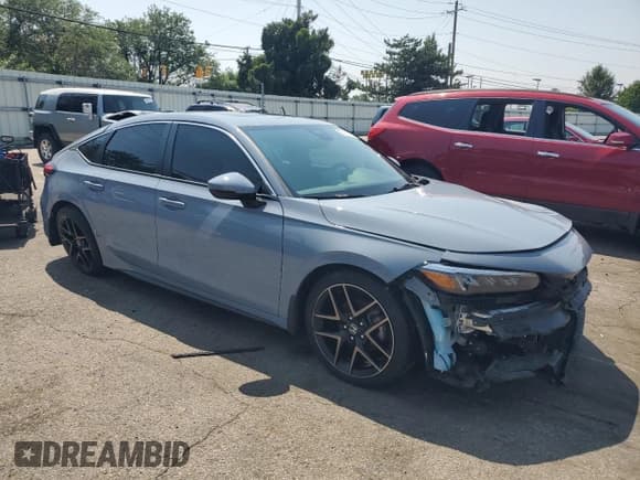 ✅ 2022 Honda Civic Sport Touring • VIN: 19XFL1H8XNE023771 • Lot: 67419715. Listed on Copart with 32,591 mi. Free auction sales archive from the USA and detailed vehicle history report at DreamBid. Image 4.