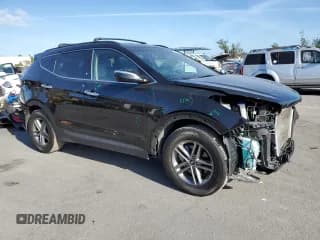 ✅ 2018 Hyundai Santa Fe 2.4L • VIN: 5XYZU3LB0JG561143 • Лот: 46826633. Опубликован ранее на Copart с пробегом 66 467 миль. Бесплатный доступ к архиву аукционных продаж из США и подробный отчёт об истории автомобиля на DreamBid. Изображение 4.