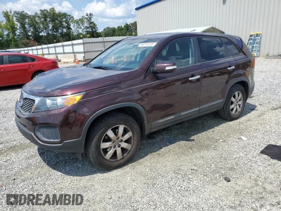 ✅ 2012 Kia Sorento LX • VIN: 5XYKT3A14CG274082 • Lot: 68319235. Listed on Copart with 197,642 mi. Free auction sales archive from the USA and detailed vehicle history report at DreamBid. Image 1.