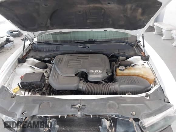 2014 Dodge Charger SXT Plus with VIN 2C3CDXHGXEH202167, listed as a IAAI auction lot 42816367 with 116,939 mi miles and . Bid and sale history available at DreamBid. Image 10.