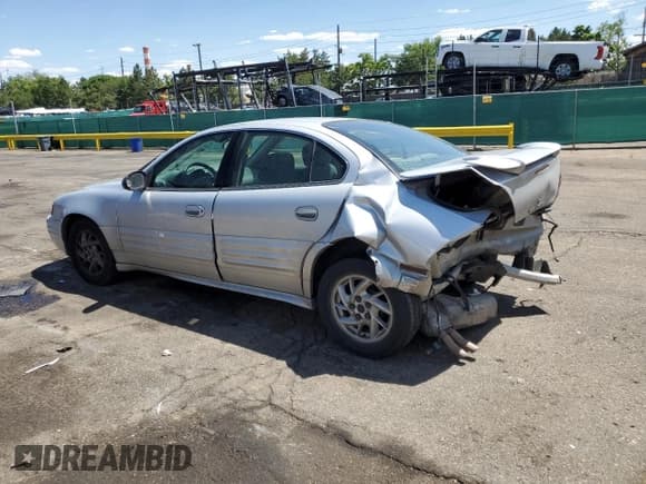 ✅ 2002 Pontiac Grand Am SE1 • VIN: 1G2NF52F12C254423 • Lot: 64235535. Listed on Copart with 198,587 mi. Free auction sales archive from the USA and detailed vehicle history report at DreamBid. Image 2.