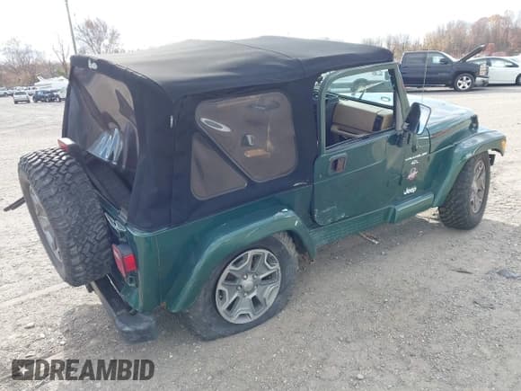 ✅ 2001 Jeep Wrangler Sahara • VIN: 1J4FA59S61P341186 • Lot: 43694775. Listed on IAAI with Not provided. Free auction sales archive from the USA and detailed vehicle history report at DreamBid. Image 4.