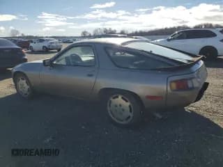 ✅ 1984 Porsche 928 • VIN: WP0JB0920ES860222 • Lot: 44055645. Wystawiony na Copart z przebiegiem 166 689 mil. Bezpłatny archiwum sprzedaży aukcyjnych z USA i szczegółowy raport historii pojazdu na DreamBid. Zdjęcie 2.