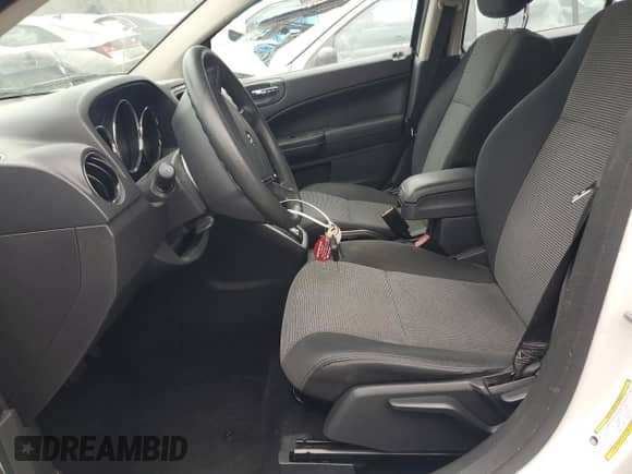 2012 Dodge Caliber SXT Plus with VIN 1C3CDWEA0CD527222, listed as a Copart auction lot 49218625 with 75,865 mi miles and Salvage title. Bid and sale history available at DreamBid. Image 7.