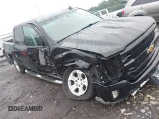 2016 Chevrolet Silverado 1500 LT z VIN 3GCUKREC5GG162120, wystawiony jako IAAI lot #42350613 z przebiegiem 263 084 mil mil oraz . Historia ofert i sprzedaży dostępna na DreamBid. Obrazek 1.