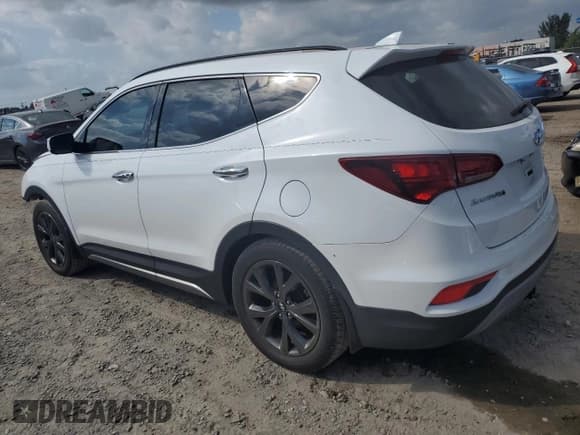 ✅ 2018 Hyundai Santa Fe Ultimate • VIN: 5XYZW4LA1JG548327 • Лот: 41119633. Опубликован ранее на Copart с пробегом 66 028 миль. Бесплатный доступ к архиву аукционных продаж из США и подробный отчёт об истории автомобиля на DreamBid. Изображение 2.