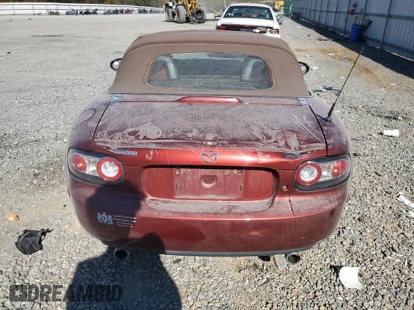 ✅ 2007 Mazda MX-5 Miata Grand Touring • VIN: JM1NC25F870128034 • Lot: 90651875. Listed on Copart with 143,059 mi. Free auction sales archive from the USA and detailed vehicle history report at DreamBid. Image 6.