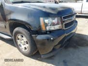 ✅ 2009 Chevrolet Suburban LS • VIN: 1GNFC16J09R300113 • Lot: 42827227. Listed on IAAI with 205,561 mi. Free auction sales archive from the USA and detailed vehicle history report at DreamBid. Image 6.