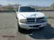 2002 Dodge Dakota SLT z VIN 1B7HL48X82S661284, wystawiony jako Copart lot #59824025 z przebiegiem 187 222 mil mil oraz Szkoda całkowita • Salvage title. Historia ofert i sprzedaży dostępna na DreamBid. Obrazek 13.