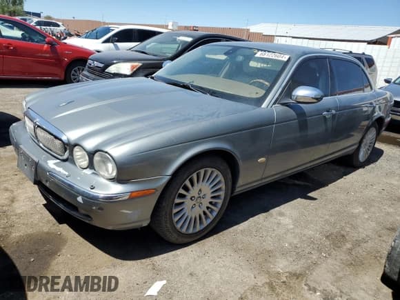 ✅ 2006 Jaguar XJ Vanden Plas • VIN: SAJWA82BX6SH09069 • Lot: 68122604. Wystawiony na Copart z przebiegiem 153 999 mil. Bezpłatny archiwum sprzedaży aukcyjnych z USA i szczegółowy raport historii pojazdu na DreamBid. Zdjęcie 1.