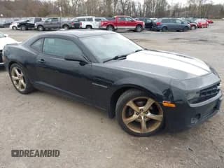 ✅ 2013 Chevrolet Camaro LT • VIN: 2G1FC1E35D9140852 • Lot: 43772311. Listed on IAAI with 154,885 mi. Free auction sales archive from the USA and detailed vehicle history report at DreamBid. Image 1.