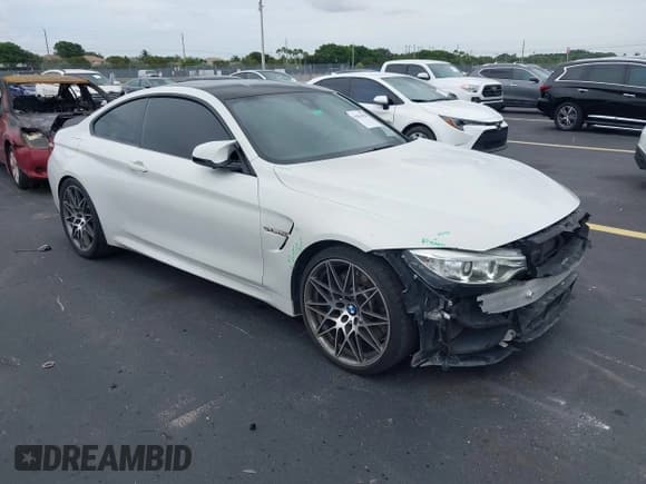 ✅ 2017 BMW M4 • VIN: WBS3R9C32HK710099 • Lot: 42654428. Listed on IAAI with 69,774 mi. Free auction sales archive from the USA and detailed vehicle history report at DreamBid. Image 1.