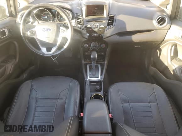 ✅ 2014 Ford Fiesta Titanium • VIN: 3FADP4FJ3EM157214 • Lot: 87443805. Wystawiony na Copart z przebiegiem 156 446 mil. Bezpłatny archiwum sprzedaży aukcyjnych z USA i szczegółowy raport historii pojazdu na DreamBid. Zdjęcie 8.