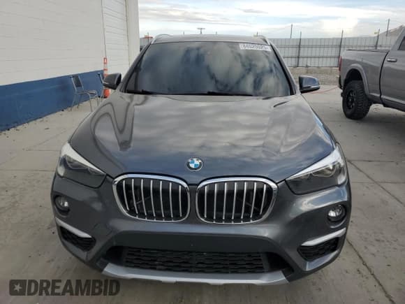 ✅ 2018 BMW X1 xDrive28i • VIN: WBXHT3C36J5K23913 • Lot: 84020025. Listed on Copart with 107,526 mi. Free auction sales archive from the USA and detailed vehicle history report at DreamBid. Image 5.