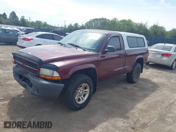 2003 Dodge Dakota with VIN 1D7GG16XX3S116003, listed as a IAAI auction lot 42341581 with Not provided miles and . Bid and sale history available at DreamBid. Image 2.