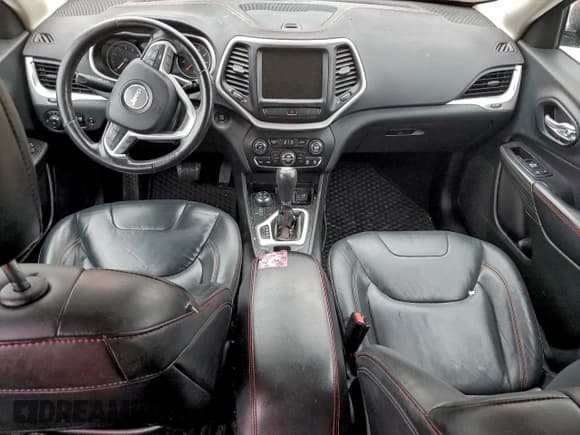 ✅ 2015 Jeep Cherokee Trailhawk • VIN: 1C4PJMBSXFW604095 • Lot: 94492305. Listed on Copart with 191,186 mi. Free auction sales archive from the USA and detailed vehicle history report at DreamBid. Image 8.