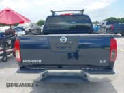 ✅ 2009 Nissan Frontier SE • VIN: 1N6AD07U59C409931 • Lot: 42987726. Wystawiony na IAAI z przebiegiem 78 133 mil. Bezpłatny archiwum sprzedaży aukcyjnych z USA i szczegółowy raport historii pojazdu na DreamBid. Zdjęcie 16.