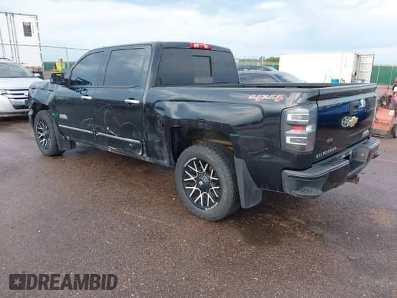 2014 Chevrolet Silverado 1500 High Country with VIN 3GCUKTEC2EG553252, listed as a IAAI auction lot 42898703 with 193,749 mi miles and . Bid and sale history available at DreamBid. Image 3.