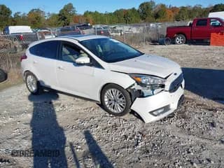 ✅ 2016 Ford Focus Titanium • VIN: 1FADP3N22GL344405 • Lot: 43612764. Listed on IAAI with 60,636 mi. Free auction sales archive from the USA and detailed vehicle history report at DreamBid. Image 1.