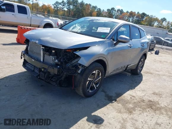 ✅ 2023 Kia Sportage LX • VIN: KNDPUCAGXP7066010 • Lot: 43511421. Listed on IAAI with 38,995 mi. Free auction sales archive from the USA and detailed vehicle history report at DreamBid. Image 2.