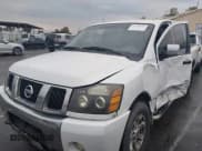 ✅ 2005 Nissan Titan SE • VIN: 1N6AA07B15N521468 • Lot: 43758534. Listed on IAAI with Not provided. Free auction sales archive from the USA and detailed vehicle history report at DreamBid. Image 2.