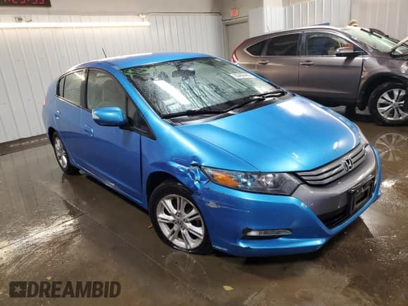 ✅ 2010 Honda Insight EX • VIN: JHMZE2H73AS036498 • Lot: 93460445. Listed on Copart with 134,324 mi. Free auction sales archive from the USA and detailed vehicle history report at DreamBid. Image 4.