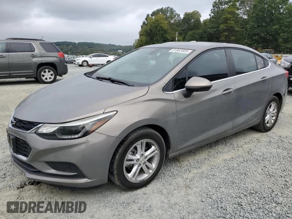 ✅ 2018 Chevrolet Cruze LT • VIN: 1G1BE5SMXJ7246580 • Lot: 81863505. Listed on Copart with 93,506 mi. Free auction sales archive from the USA and detailed vehicle history report at DreamBid. Image 1.