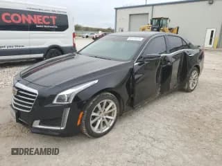 ✅ 2017 Cadillac CTS AWD • VIN: 1G6AW5SX5H0171853 • Лот: 80124974. Опубликован ранее на Copart с пробегом 105 349 миль. Бесплатный доступ к архиву аукционных продаж из США и подробный отчёт об истории автомобиля на DreamBid. Изображение 1.
