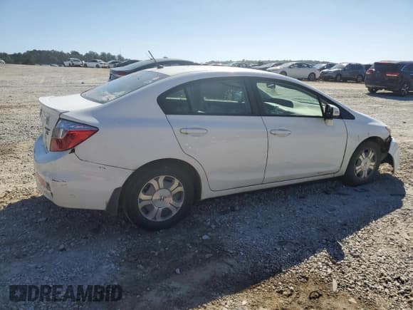 ✅ 2012 Honda Civic • VIN: JHMFB4F28CS011338 • Lot: 82193365. Listed on Copart with 79,642 mi. Free auction sales archive from the USA and detailed vehicle history report at DreamBid. Image 3.
