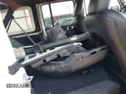 ✅ 2018 Jeep Wrangler Unlimited Sahara • VIN: 1C4HJXEG0JW321355 • Lot: 42343112. Listed on IAAI with 102,457 mi. Free auction sales archive from the USA and detailed vehicle history report at DreamBid. Image 8.