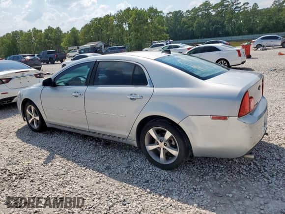 2012 Chevrolet Malibu 1LT z VIN 1G1ZC5EU6CF116093, wystawiony jako Copart lot #80727035 z przebiegiem 260 021 mil mil oraz Szkoda całkowita • Salvage title. Historia ofert i sprzedaży dostępna na DreamBid. Obrazek 2.