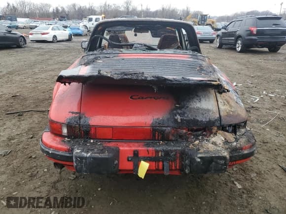 ✅ 1988 Porsche 911 • VIN: WP0EB0914JS161419 • Лот: 74511944. Опубликован ранее на Copart с пробегом 90 583 миль. Бесплатный доступ к архиву аукционных продаж из США и подробный отчёт об истории автомобиля на DreamBid. Изображение 6.