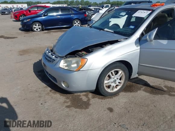 ✅ 2005 Kia Spectra LX • VIN: KNAFE121955143141 • Lot: 42767872. Listed on IAAI with 178,724 mi. Free auction sales archive from the USA and detailed vehicle history report at DreamBid. Image 6.