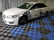 ✅ 2018 Lincoln MKZ Select • VIN: 3LN6L5C99JR613241 • Lot: 84981215. Wystawiony na Copart z przebiegiem 76 434 mil. Bezpłatny archiwum sprzedaży aukcyjnych z USA i szczegółowy raport historii pojazdu na DreamBid. Zdjęcie 1.